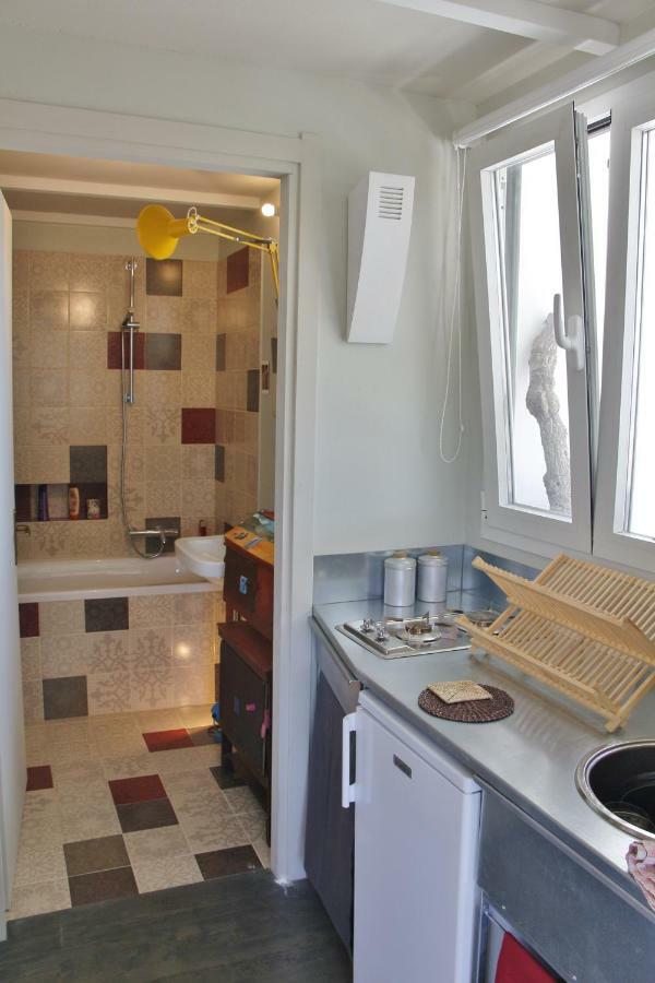 Mini Attico Panoramico Con Terrazza Apartment กาญารี ภายนอก รูปภาพ